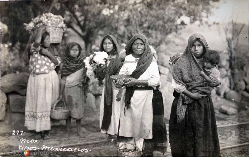 Tipos mexicanos vendedoras de flores.