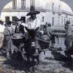 Aguador, luego de haber llenado sus jarros en una fuente