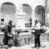 Aguadores en una fuente (por William Henry Jackson, c. 1888)